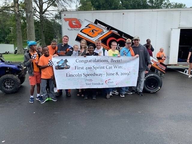 JR Racing with photo of supporters and the winners