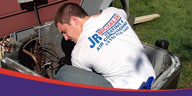 JR Michalski air conditioning technician servicing an AC unit in Bucks County PA