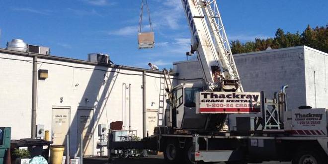 JR Michalski commercial HVAC technician servicing rooftop equipment in Langhorne PA